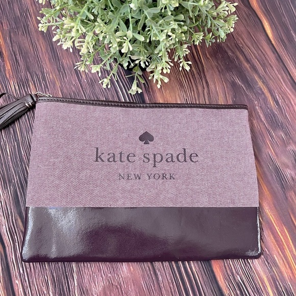 kate spade Handbags - Kate Spade *like new* purple eggplant color Ash Street pouch/wristlet